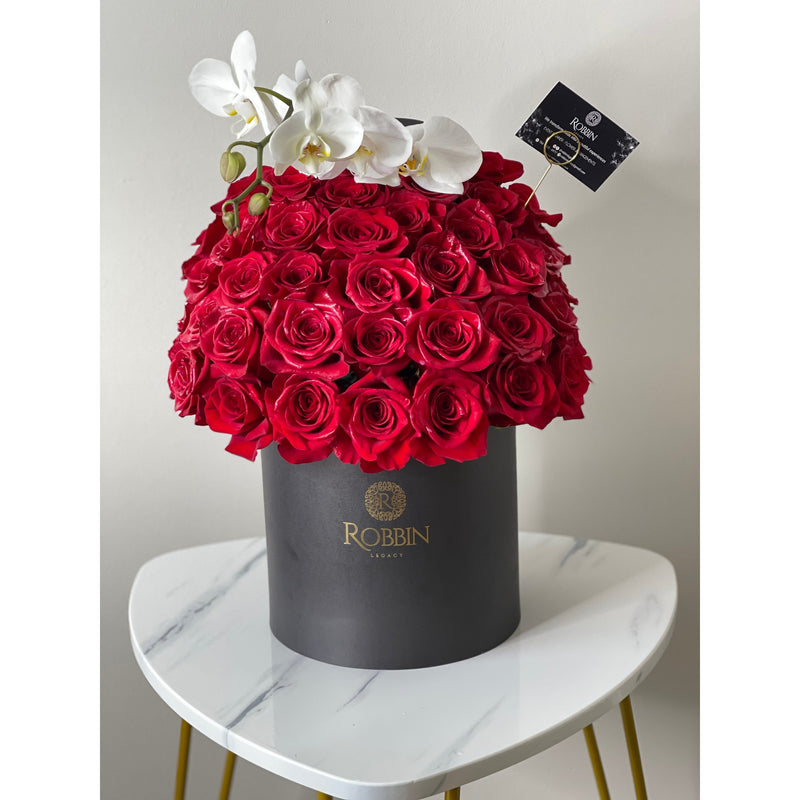 Hat Box 50 Fresh Roses Flowers and orchids Miami Florida.. Fresh Flowers Robbin Legacy 